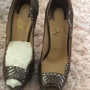 Christian Loubitans pewter color barely worn.